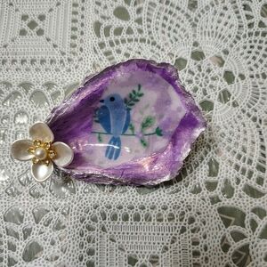 Decoupaged blue bird print with resin top finish.